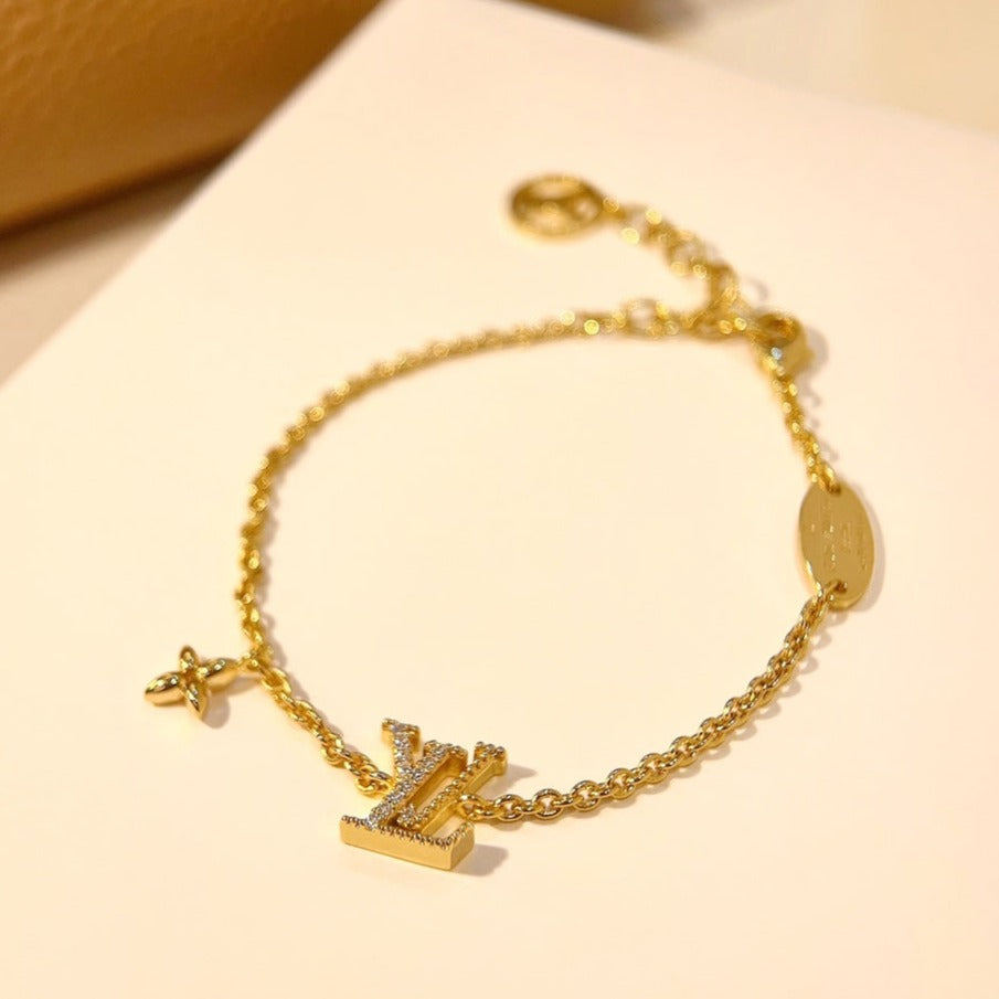 [Baslove] GOLDARMBAND MIT LV-LOGO UND STERNMOTIV