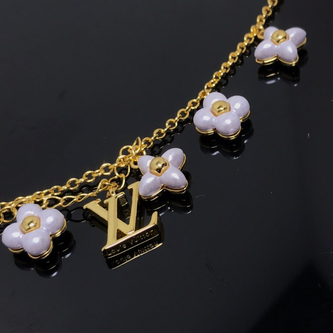 [Baslove]Goldarmband mit LV-Logo und 6 Motiven, Sternen und Sonne